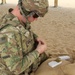 A Task Force Spartan Soldier loads magazine for SIG SAUER M17 during the TF Spartan small arms competition