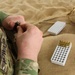 A Task Force Spartan Soldier loads magazine for SIG SAUER M17 during TF Spartan small arms competition