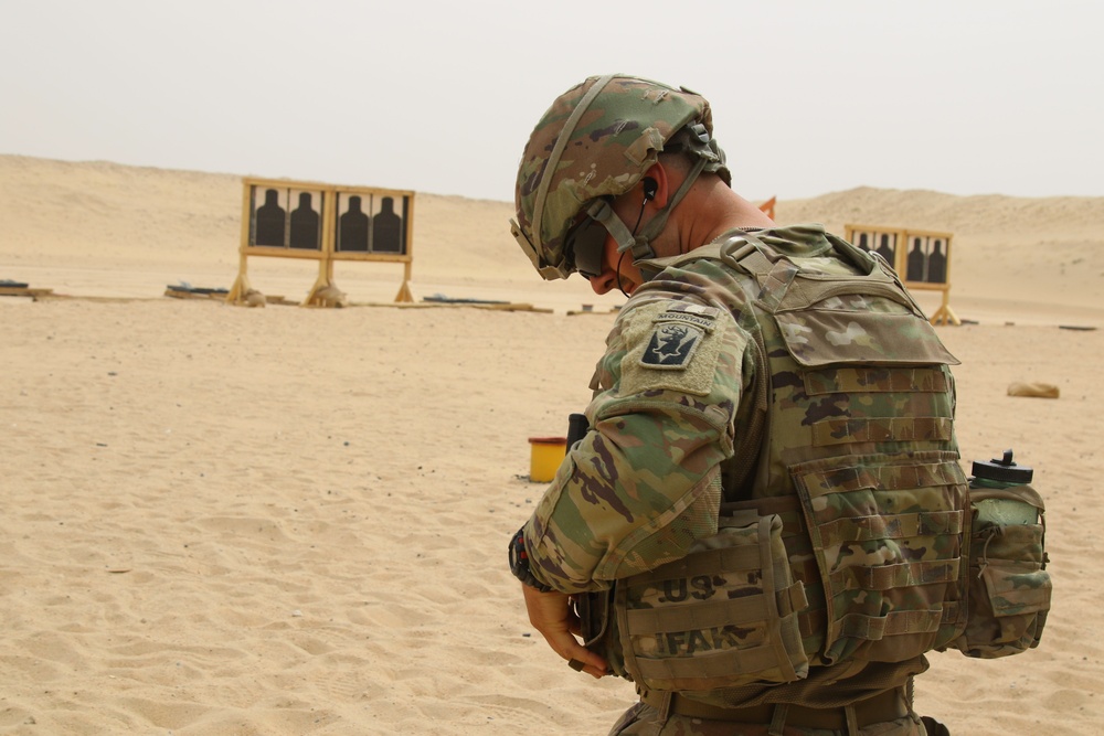 A Task Force Spartan Soldier participates in TF Spartan 2nd Annual Small Arms Marksmanship Competition