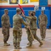 Capt. Benjamin Smith, Task Force Spartan, passes guidon during change of command