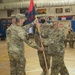 1st Sgt. Abel Nasser passes guidon to outgoing command at change of command