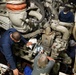 Coast Guard Cutter Stratton machinery technicians conduct engine maintenance