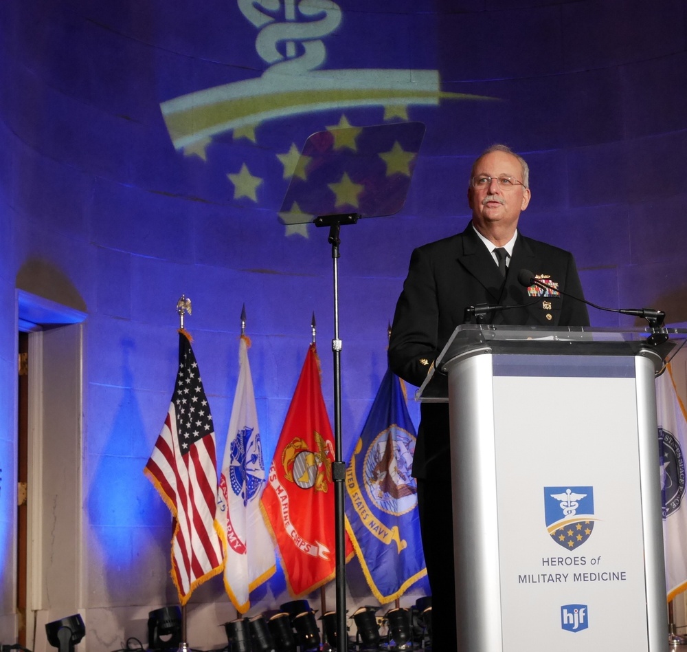 Rear Adm. Bruce Gillingham Awards Lt. Cmdr. Matthew Hall as the Navy Hero of Military Medicine