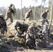 British and U.S. Soldiers take a breath to communicate.