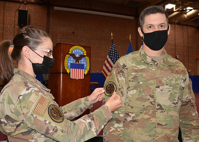 Airmen show unit cohesion by wearing new DLA Aviation unit patch