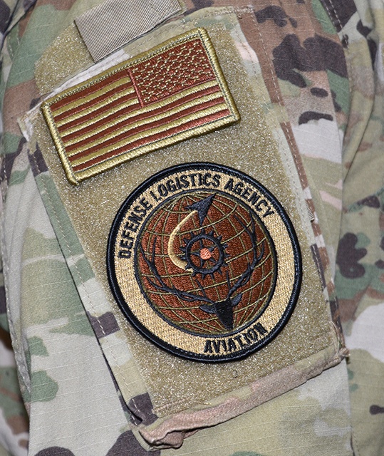 Airmen show unit cohesion by wearing new DLA Aviation unit patch