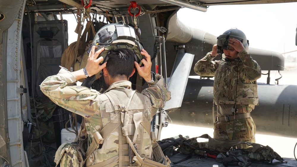 Task Force Phoenix MEDEVAC helicopters fuel up during MEDEVAC mission