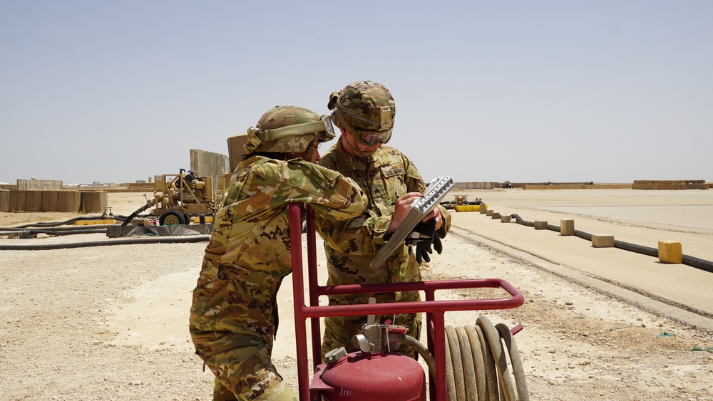 Task Force Phoenix MEDEVAC helicopters fuel up during MEDEVAC mission