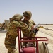 Task Force Phoenix MEDEVAC helicopters fuel up during MEDEVAC mission