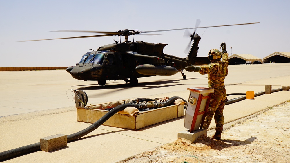 Task Force Phoenix MEDEVAC helicopters fuel up during MEDEVAC mission