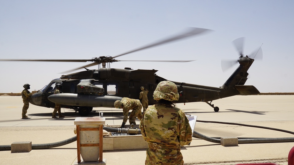 Task Force Phoenix MEDEVAC helicopters fuel up during MEDEVAC mission