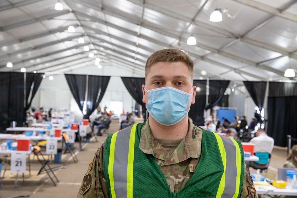Airmen enjoys change of pace while deploying on COVID vaccination mission