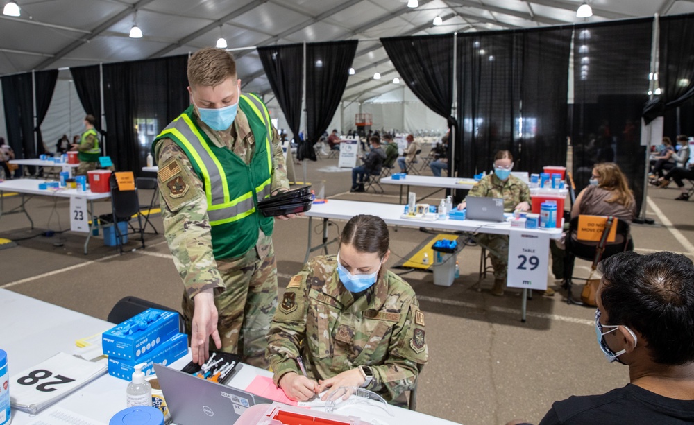 Airmen enjoys change of pace while deploying on COVID vaccination mission
