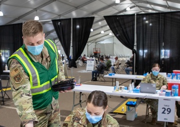 Airmen enjoys change of pace while deploying on COVID vaccination mission
