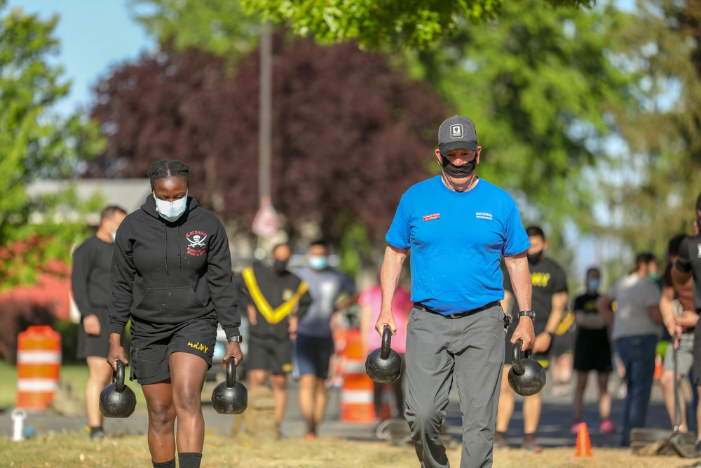 US Army Soldiers conduct team building exercise with civilian partners