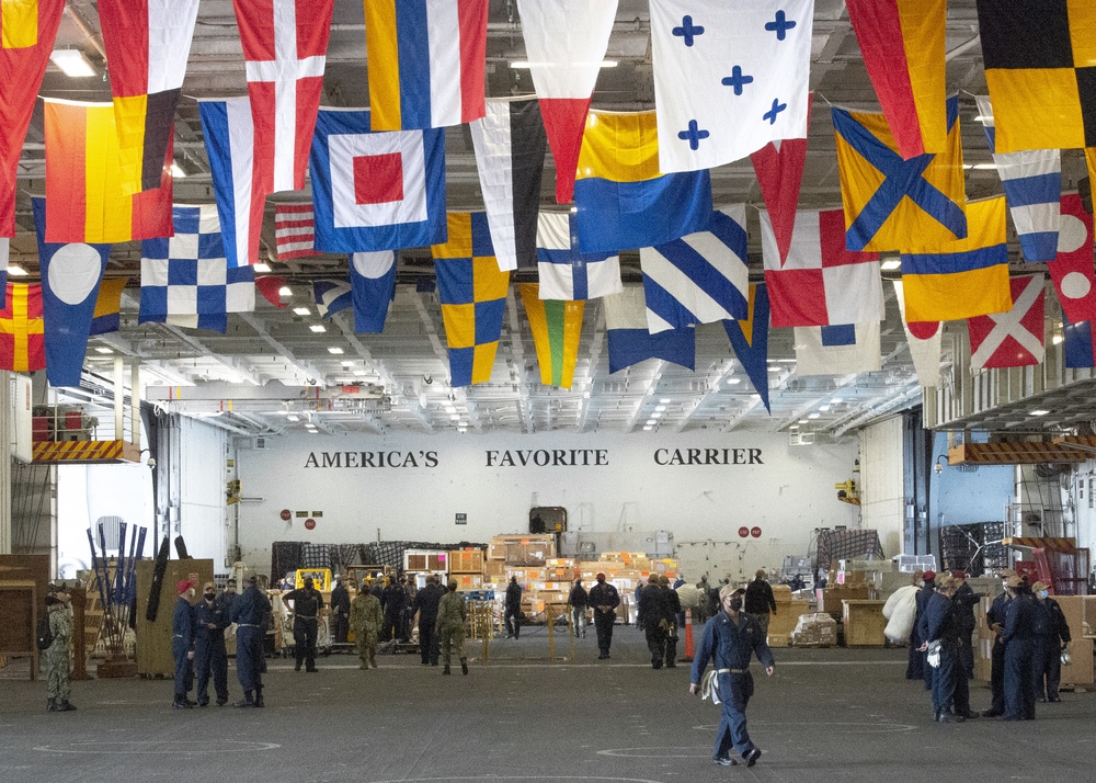 USS Carl Vinson (CVN 70) Sailors Transit Hangar Bay