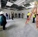 Leaders review barracks construction at Fort McCoy