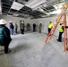Leaders review barracks construction at Fort McCoy