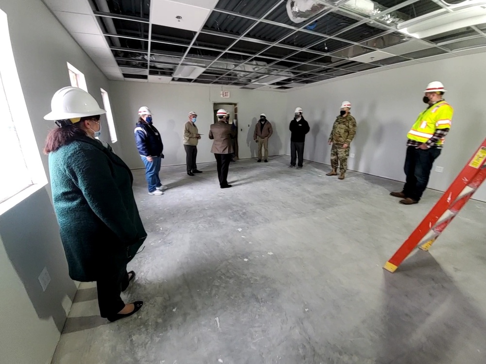 Leaders review barracks construction at Fort McCoy