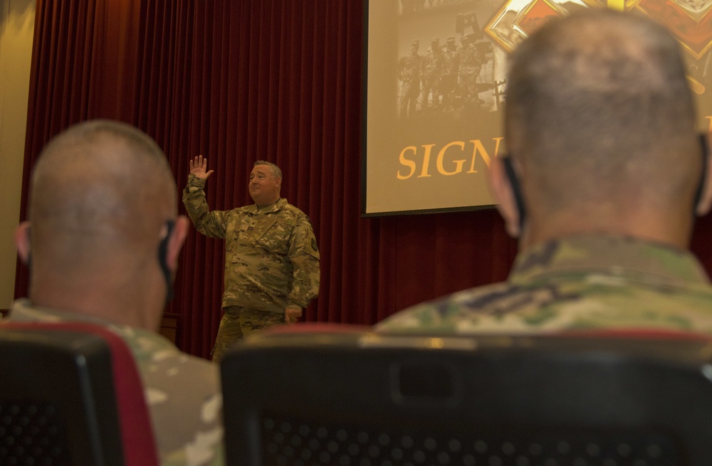 Brig. Gen. Jonathan C. Moyer, 335th Signal Theater Provisional commander, speaks to Task Force Spartan recipients of Signal Corps Bronze Order of Mercury