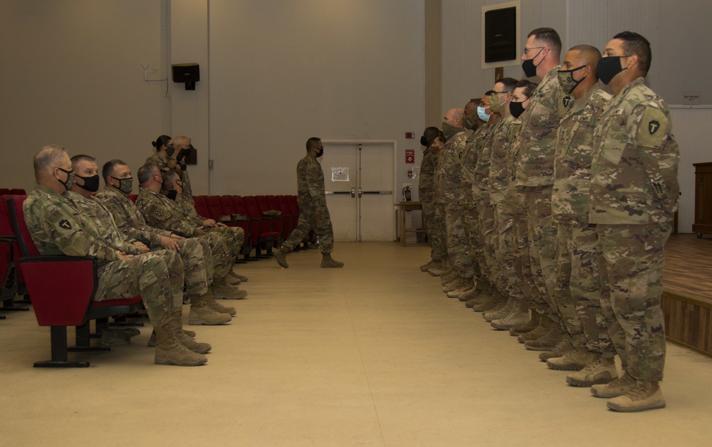 U.S. Army Signal Soldiers, 36th Infantry Division, Task Force Spartan, stand ready to receive The Bronze Order of Mercury