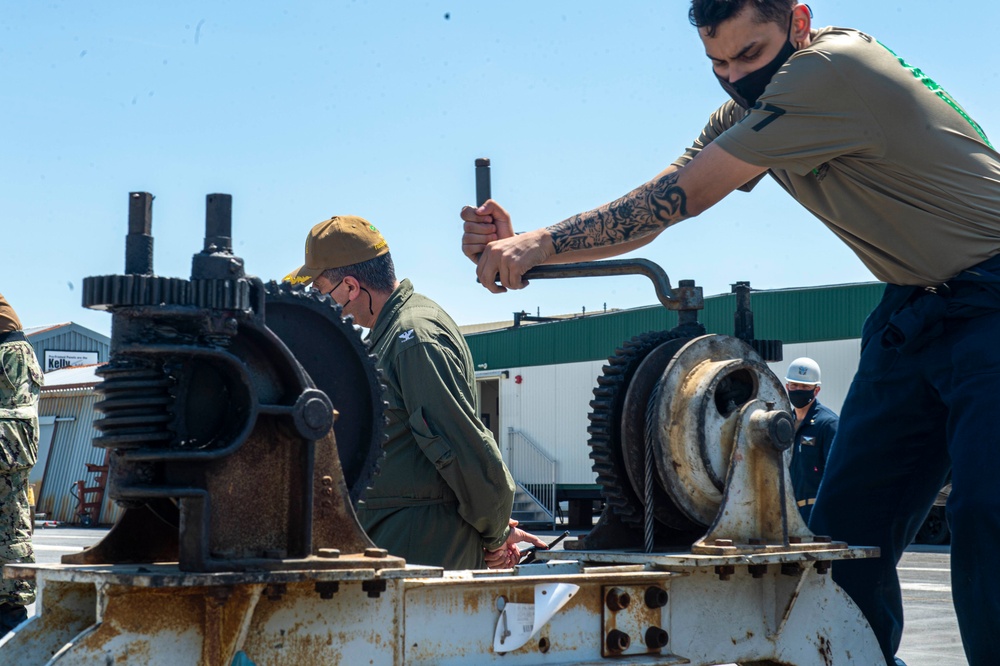 Sailors Conduct Catapult Maintenance