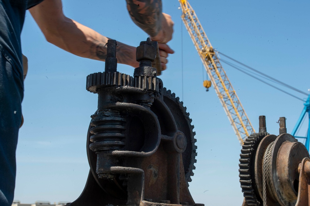 Sailors Conduct Catapult Maintenance