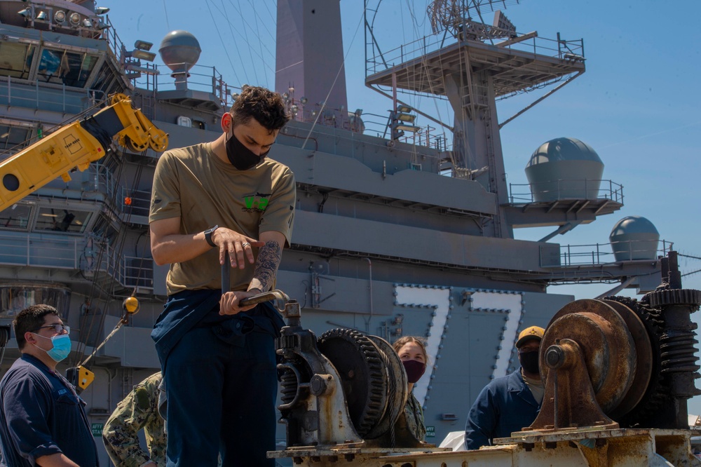 Sailors Conduct Catapult Maintenance