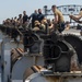 Sailors Conduct Catapult Maintenance