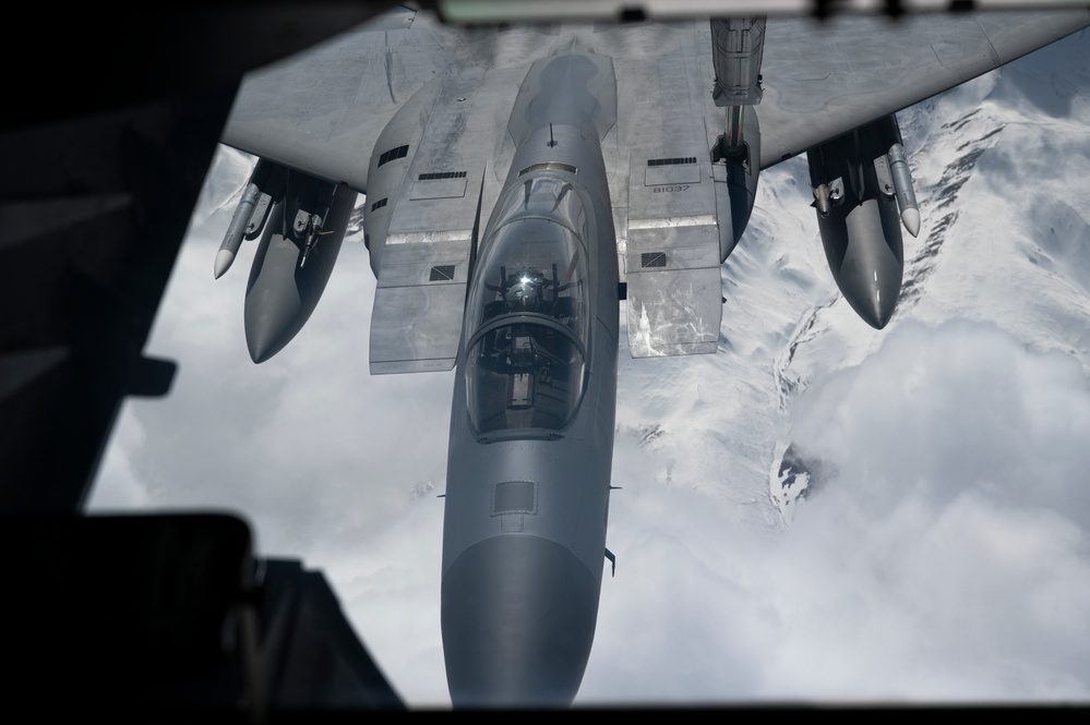 Eagles and Raptors Refuel Over Alaska