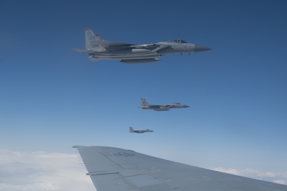 Eagles and Raptors Refuel Over Alaska