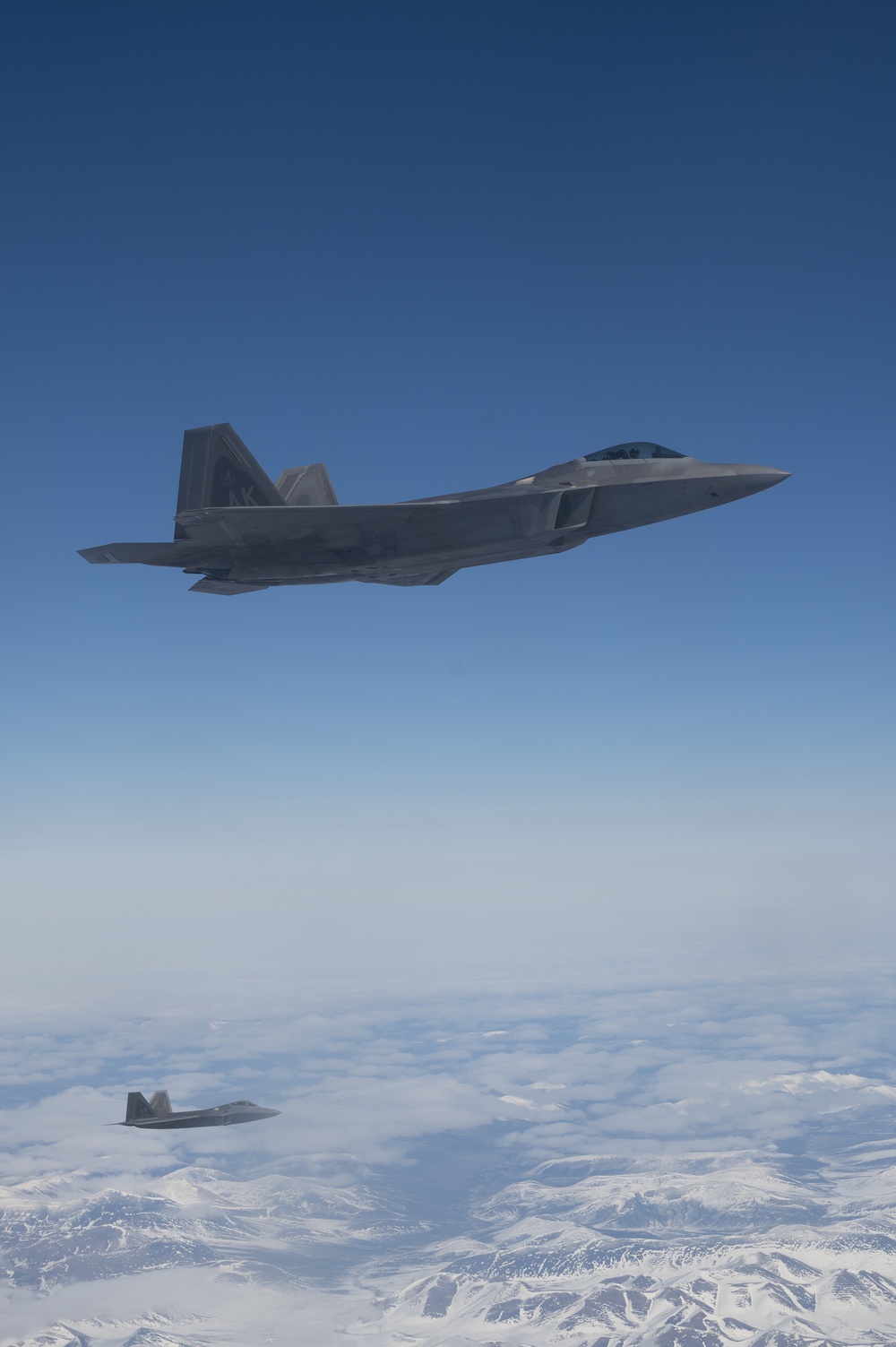 Eagles and Raptors Refuel Over Alaska