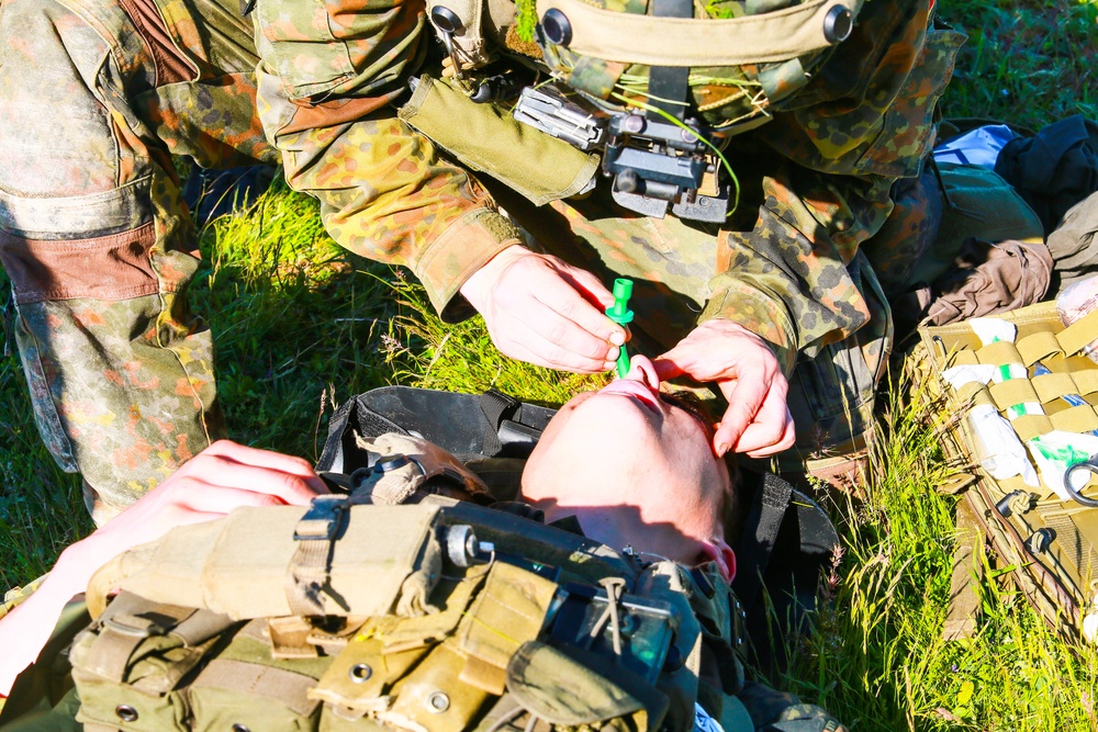 A German Soldier Provides Casualty Care