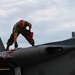 Crew chief removes flying flags during Sentry Savannah 2021 (PST 3 of 8)