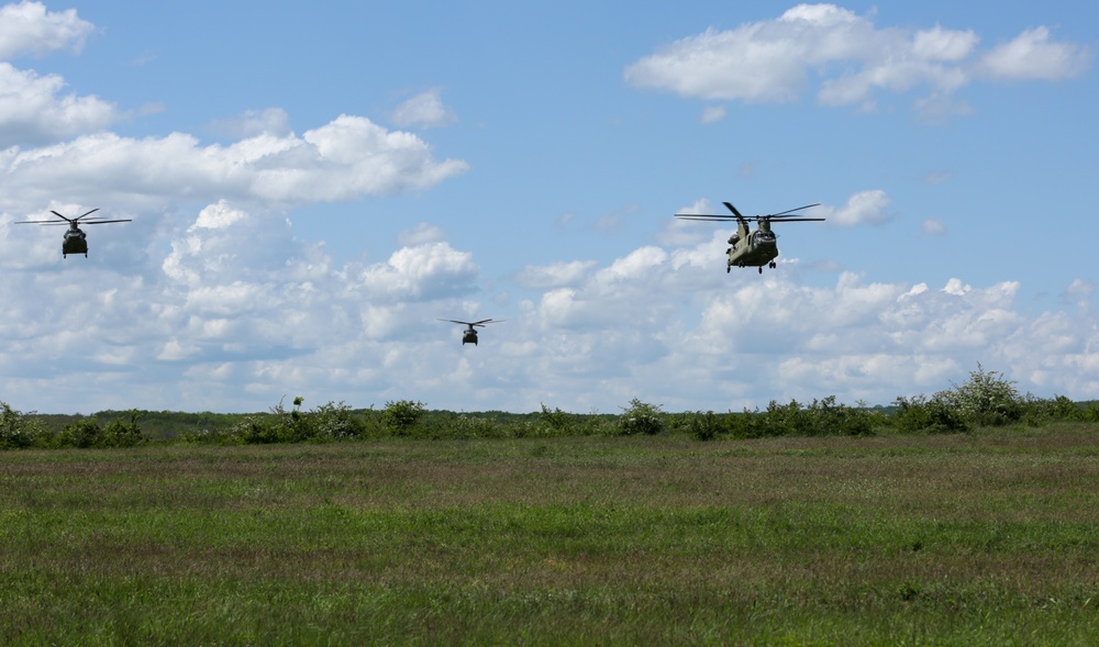 CH-47 Chinook Helicopters fly over