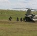 Soldiers exit CH-47 Chinook Helicopter