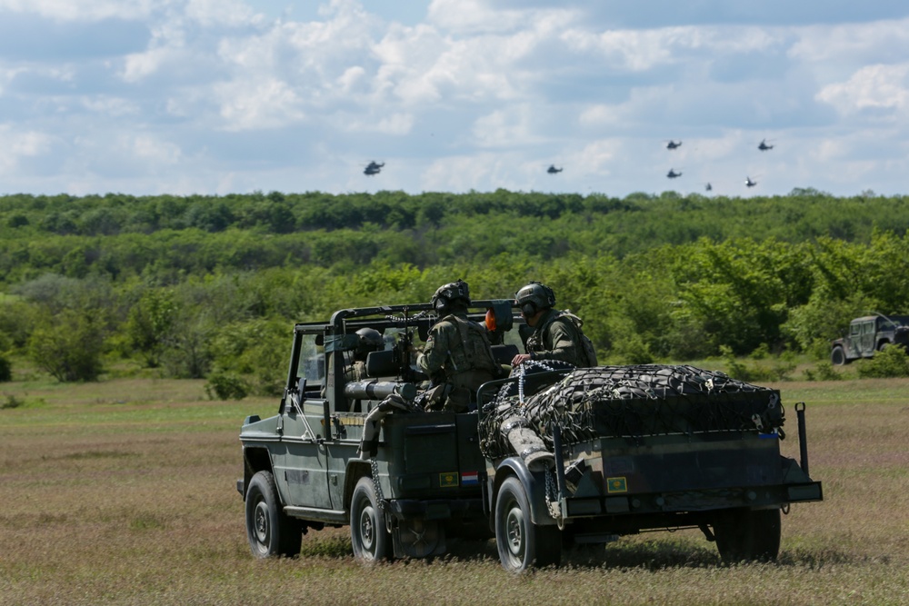 Soldiers drive off the landing zone