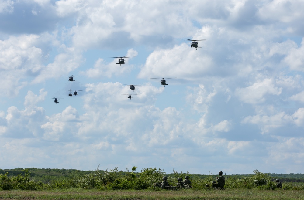 Blackhawk Helicopters fly overhead