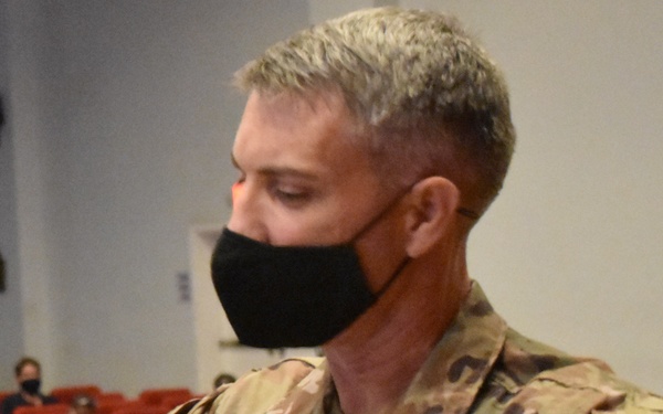 Afghanistan District cases its colors for the final time