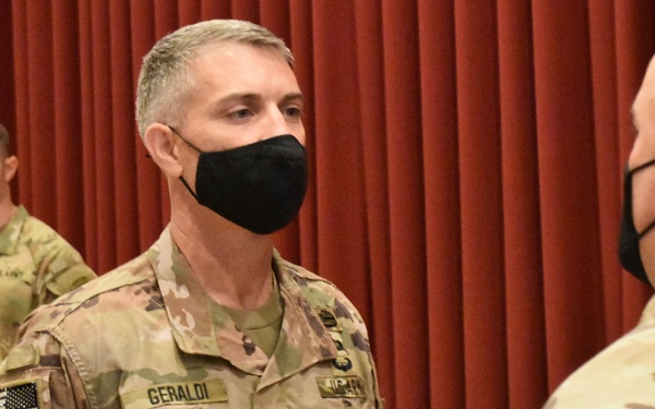 Afghanistan District cases its colors for the final time