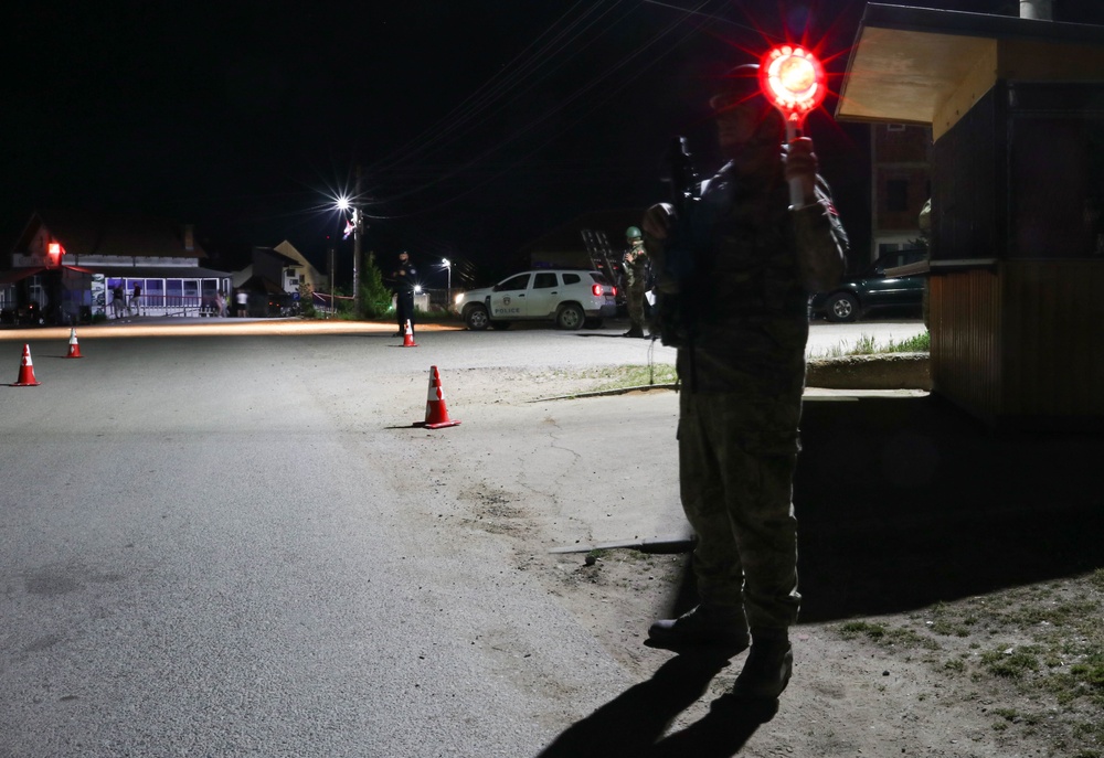 Turkish KFOR Soldiers conduct patrol with Kosovo Police