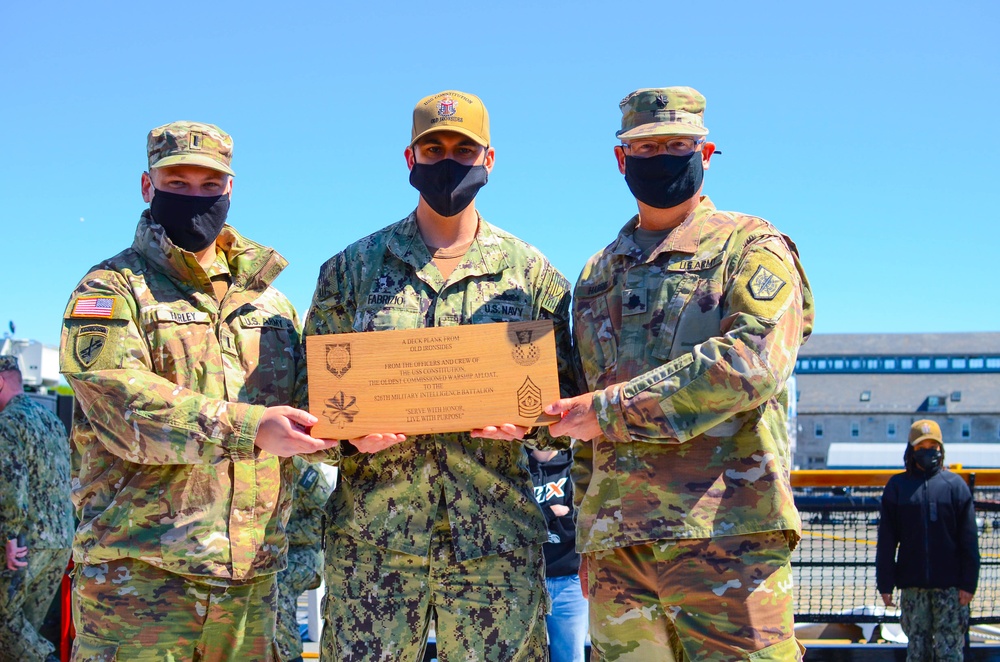 LTC Harris receiving a plank from the USS Constitution