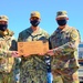 LTC Harris receiving a plank from the USS Constitution