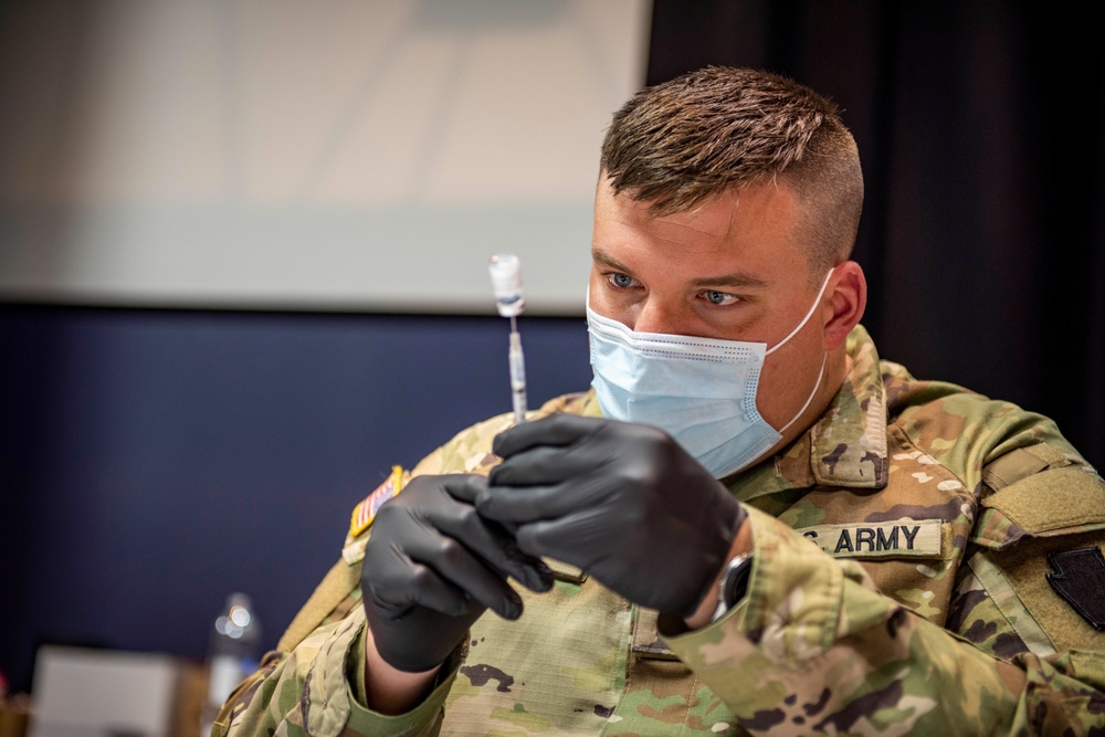 Pa. National Guard members administer COVID-19 vaccine in Philadelphia