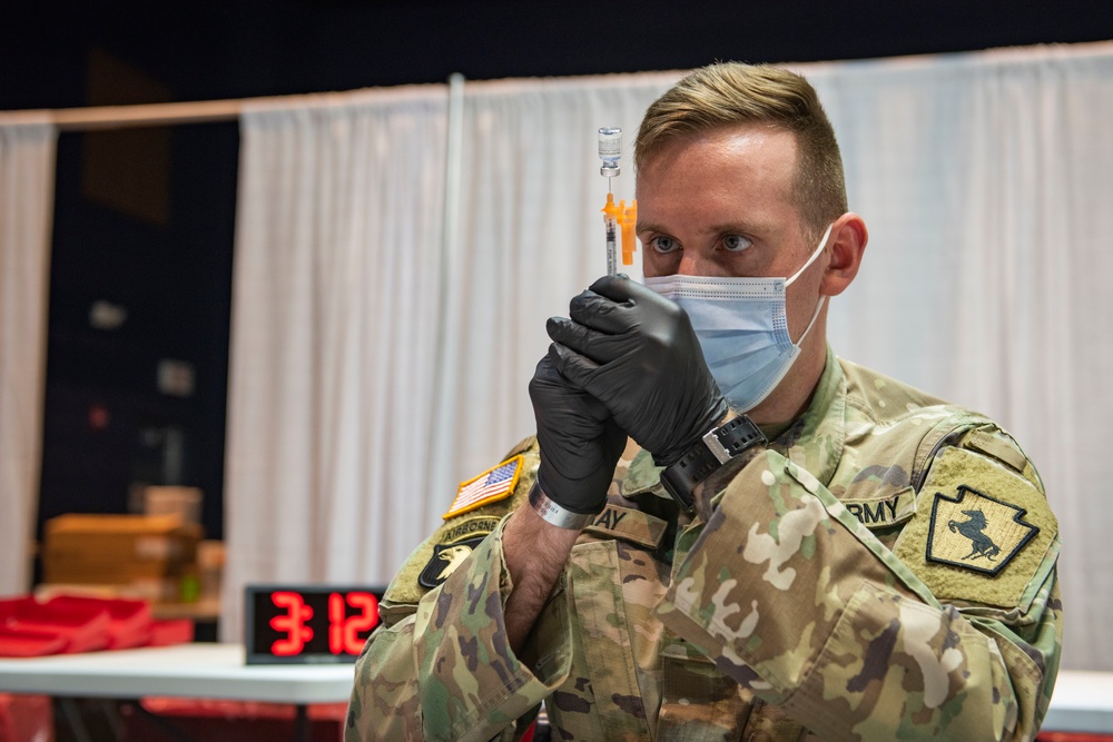 Pa. National Guard members administer COVID-19 vaccine in Philadelphia