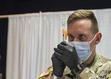 Pa. National Guard members administer COVID-19 vaccine in Philadelphia