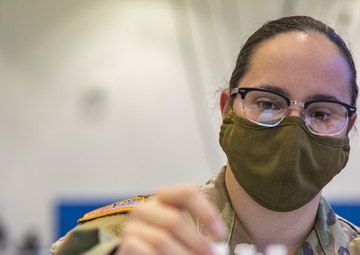 Pa. National Guard members administer COVID-19 vaccine in Philadelphia