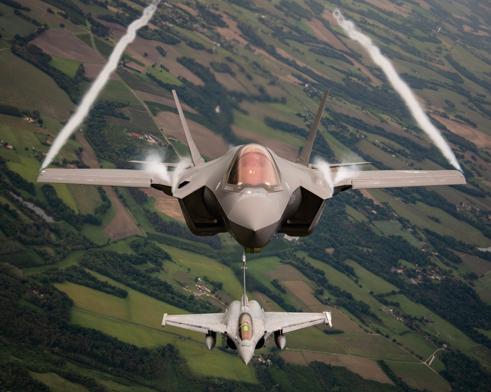 U.S. Air Force F-35As and French Rafales perform formation flight over France