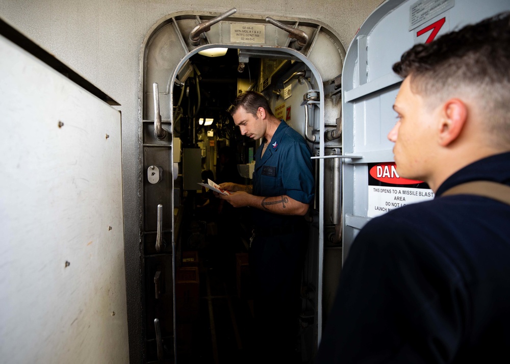 USS Sioux City Sailors Secure Weapons Prior to Pulling into Port