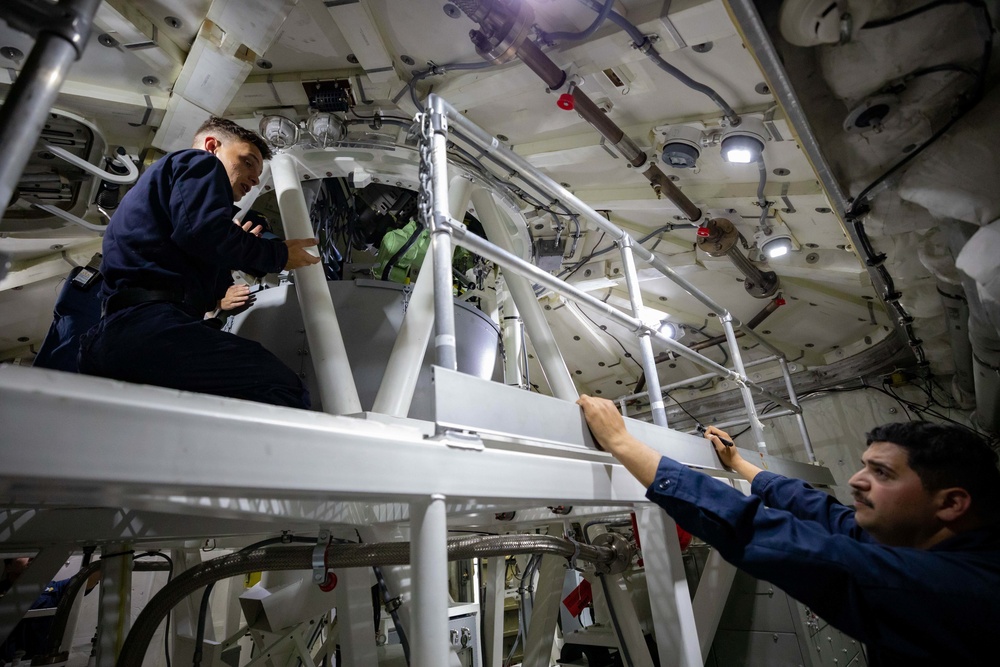 USS Sioux City Sailors Secure Weapons Prior to Pulling into Port